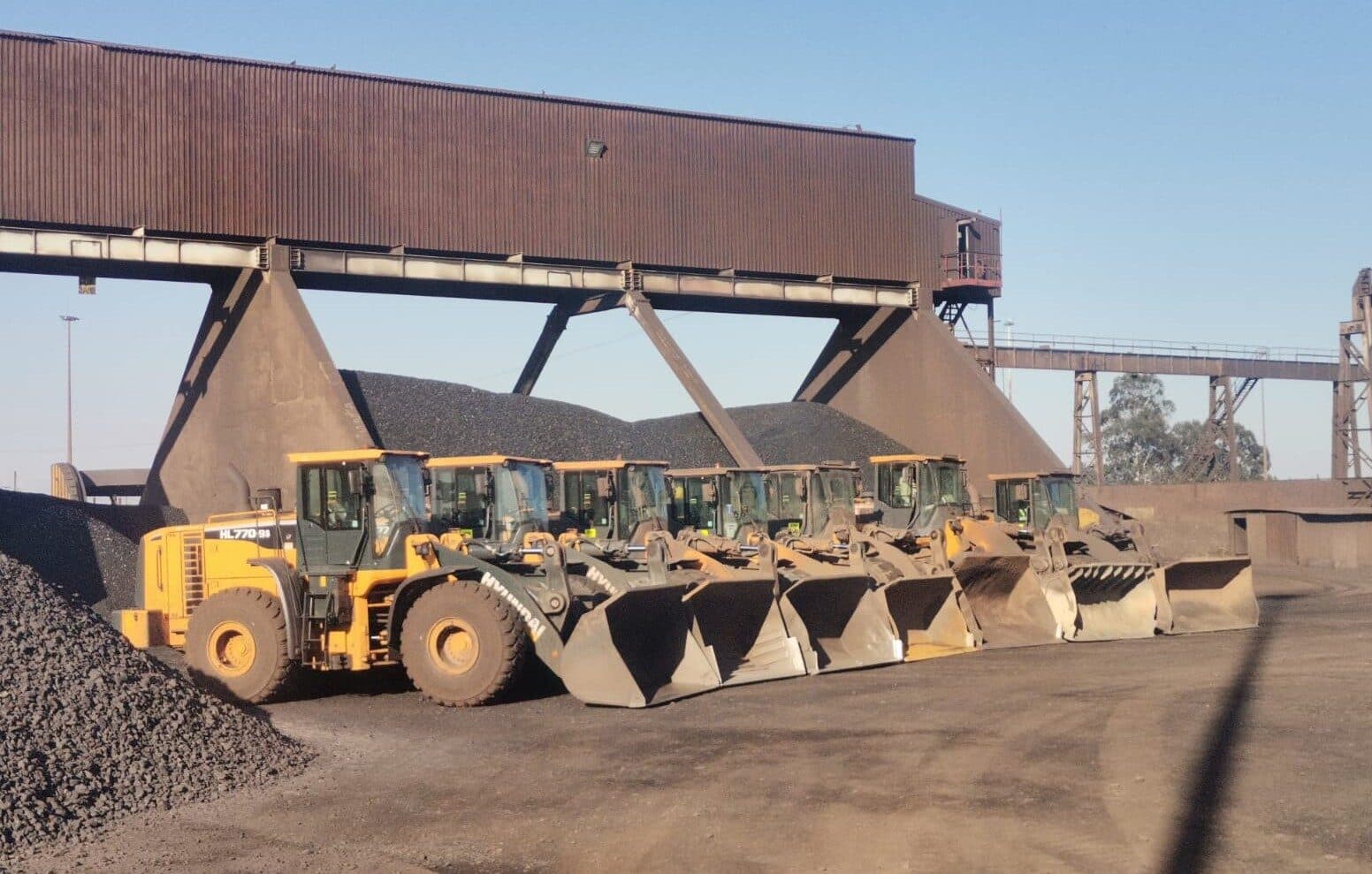 Wheel loader on a stockpile